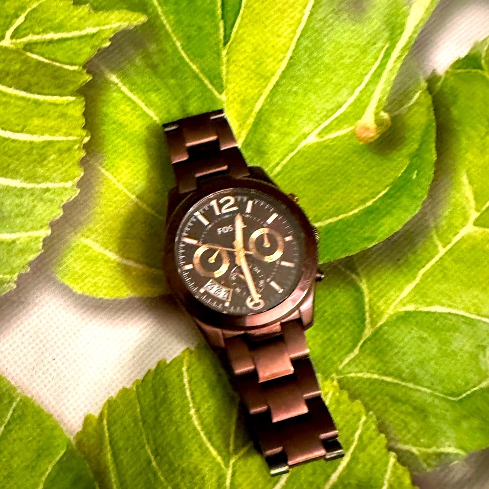 Women’s maroon fossil watch